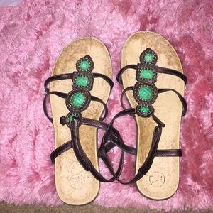 Brown sandals with turquoise gem detailing